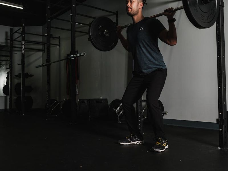 Man focusing before a workout, calm and collected expression.